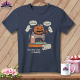Jack-o'-lantern sewing on pink machine with ghosts and text.