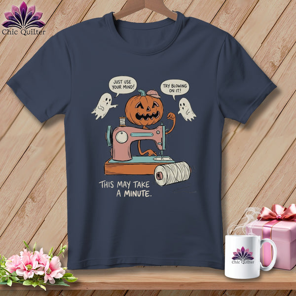 Jack-o'-lantern sewing on pink machine with ghosts and text.