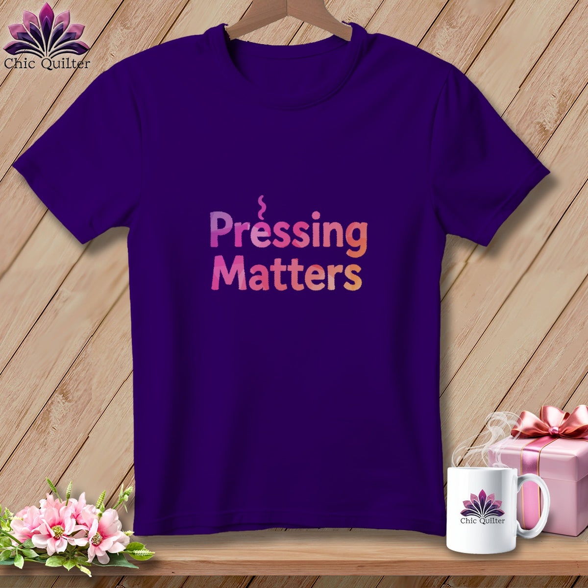 Purple t-shirt with "Pressing Matters" text in pink and orange gradient.