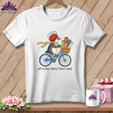White t-shirt with a penguin on a bicycle carrying fabric rolls.
