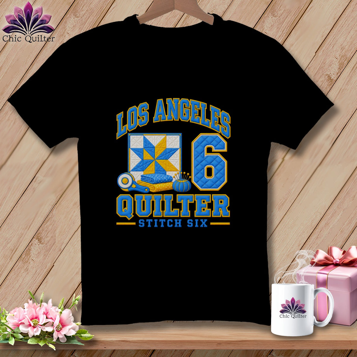 A black t-shirt featuring Los Angeles Quilter Stitch Six text, a quilt block, and the number six.