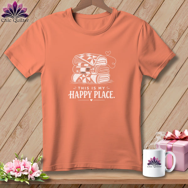 Orange t-shirt with stacked quilts graphic and "This is my happy place" text.