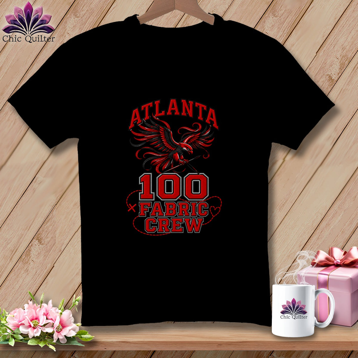 Black t-shirt featuring a red and black Atlanta Fabric Crew graphic with an eagle illustration.