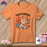 Orange crewneck t-shirt featuring a cartoon illustration of cartoon chickens and the text 