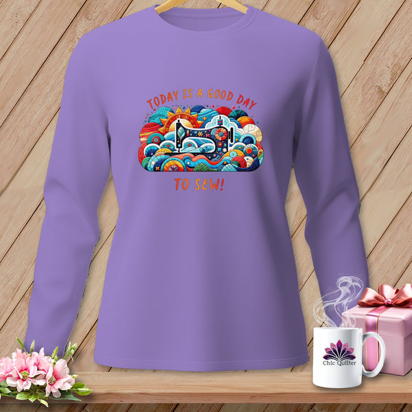 Purple long-sleeve shirt with "Today is a good day to sew!" graphic.