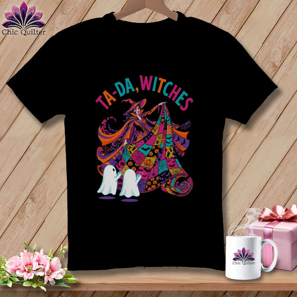 Black t-shirt with Halloween witch, ghosts, pumpkins, and text "Ta-Da, Witches".