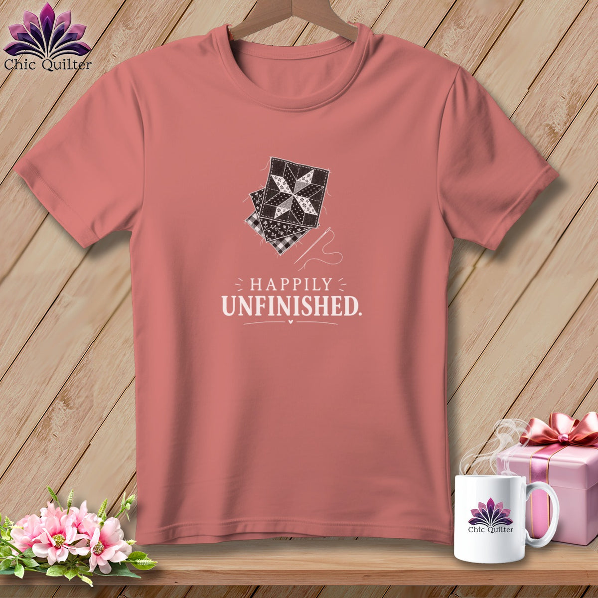 T-shirt with patchwork design and text "Happily Unfinished."