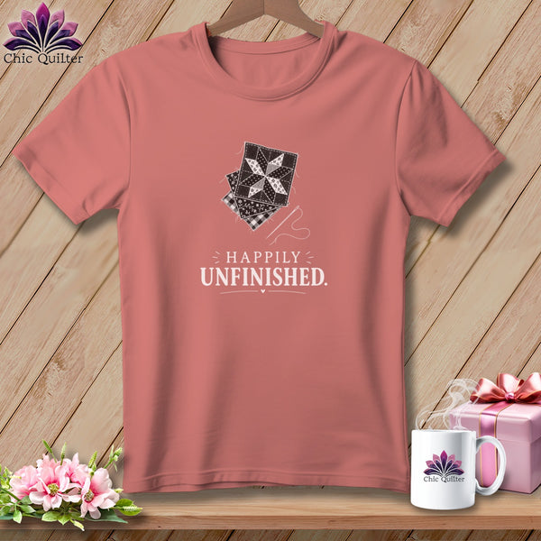 T-shirt with patchwork design and text "Happily Unfinished."