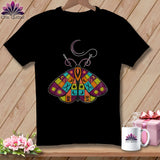 Black t-shirt with a colorful patchwork moth design and sewing elements.