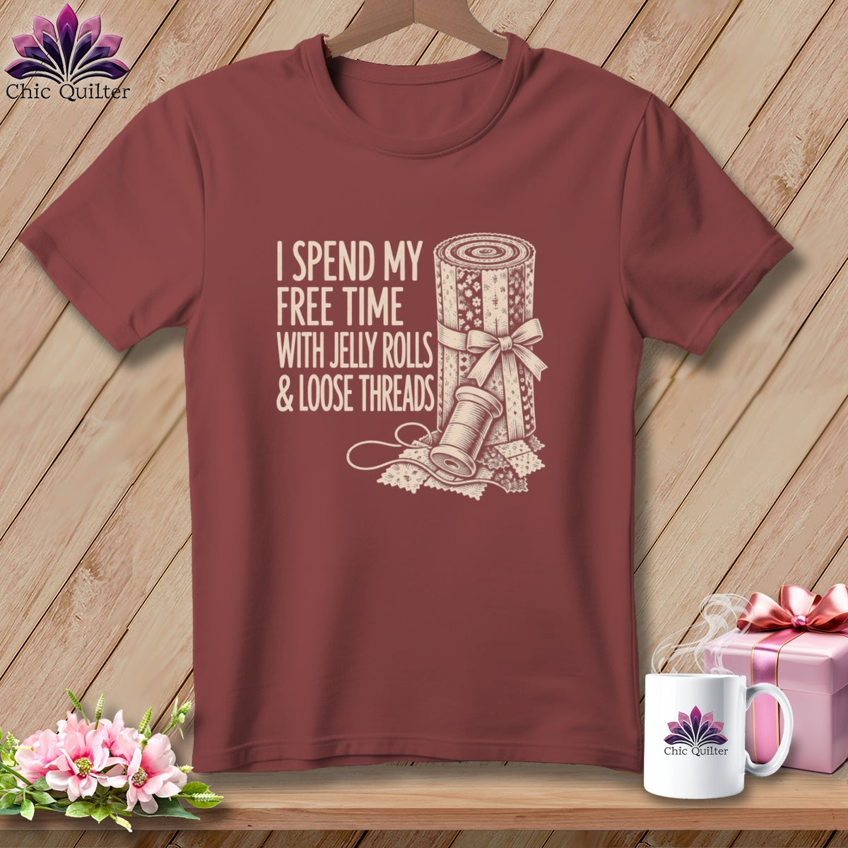 Maroon t-shirt with text "I spend my free time with jelly rolls & loose threads."