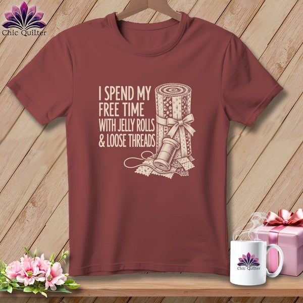 Maroon t-shirt with text "I spend my free time with jelly rolls & loose threads."