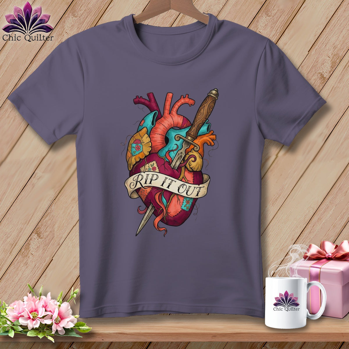 T-shirt with a stylized anatomical heart pierced by a dagger and banner reading "RIP IT OUT".