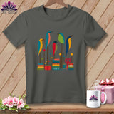 A charcoal gray crewneck t-shirt featuring a graphic illustration of five colorful birds perched among sewing notions.