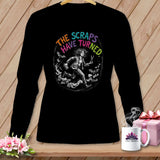 Black t-shirt with a circular graphic of a woman running, holding scissors, with text 