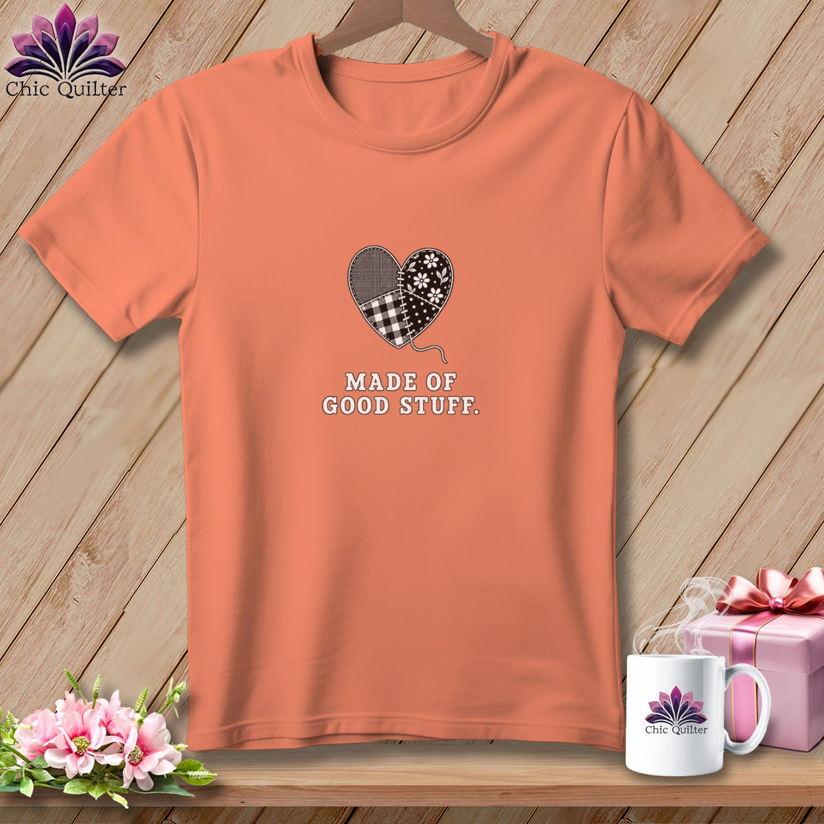 Peach t-shirt with a quilted heart graphic that reads "MADE OF GOOD STUFF."