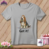 Grey t-shirt with a cartoon basset hound tangled in yarn, saying 