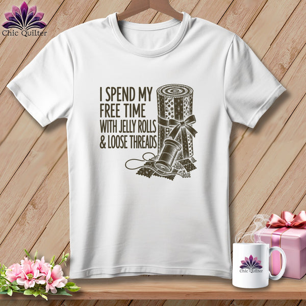 White t-shirt with "I spend my free time with jelly rolls & loose threads" text and illustration.