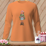 Flamingo wearing scarf and boots holding a blue star gift box on orange shirt.