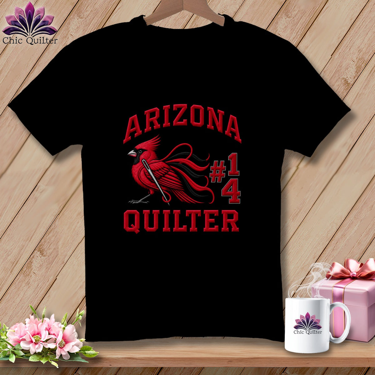A black t-shirt features a red cardinal graphic holding a sewing needle, along with the text Arizona Quilter 14.