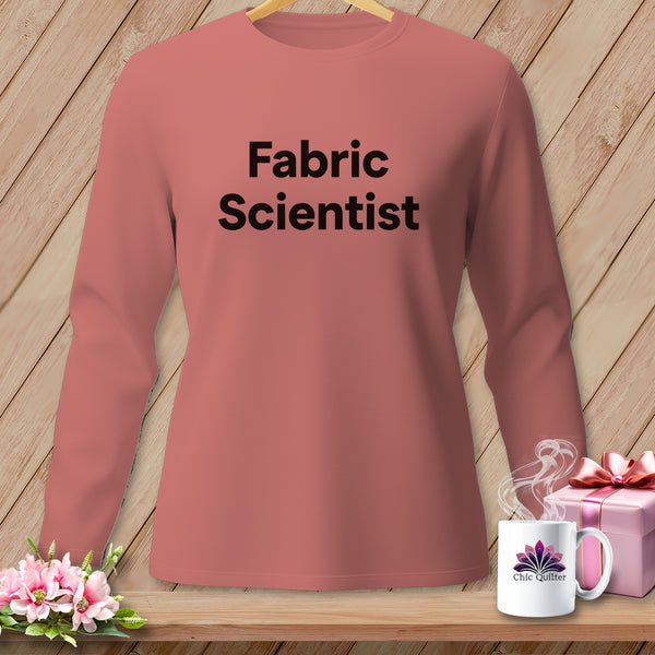Pink long-sleeve shirt with "Fabric Scientist" text, mug, and gift box.