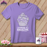 Lavender t-shirt with white graphic of a basket overflowing with fabric and text 