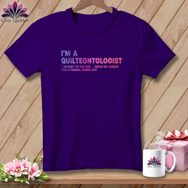 Purple t-shirt with "I'm a Quilteontologist" and quote.
