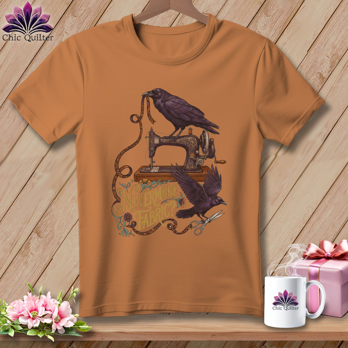 Orange t-shirt with crows, antique sewing machine, and "Nevermore Fabric?" text.