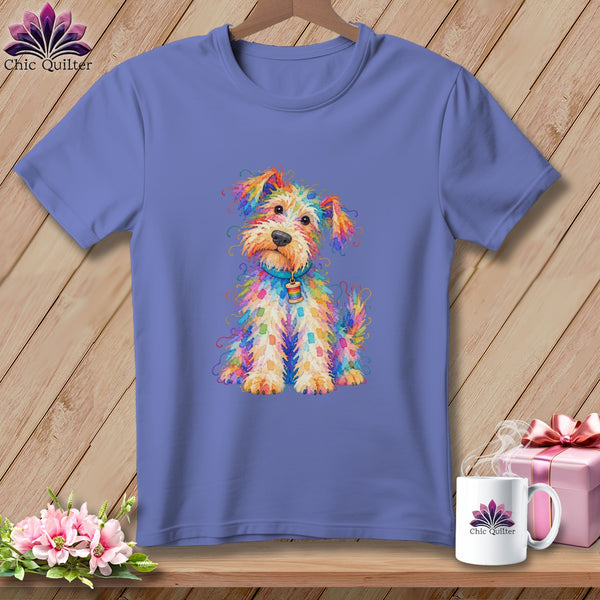 Blue t-shirt featuring a colorful, sketchy illustration of a scruffy dog on a wooden background.