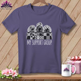 T-shirt with three women peeking over a quilt, text 