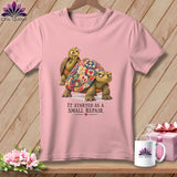 Pink t-shirt with two tortoises and text 