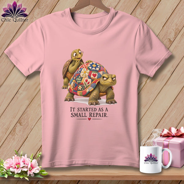 Pink t-shirt with two tortoises and text "IT STARTED AS A SMALL REPAIR."
