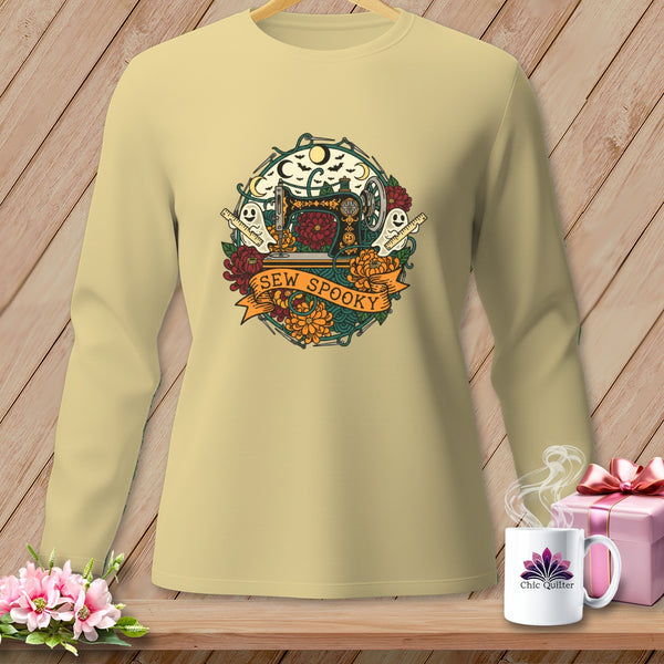 Light yellow long-sleeve shirt with a "Sew Spooky" Halloween sewing machine graphic.