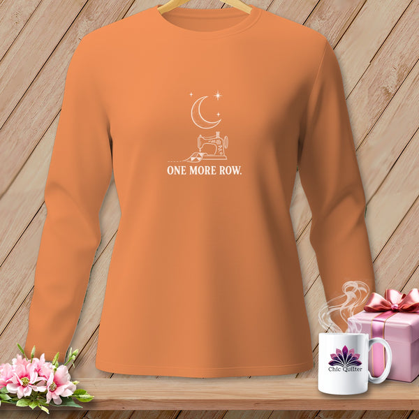 Orange long-sleeved shirt with sewing machine graphic and text "ONE MORE ROW."