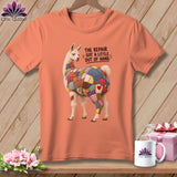 Peach t-shirt with a llama graphic and the text 