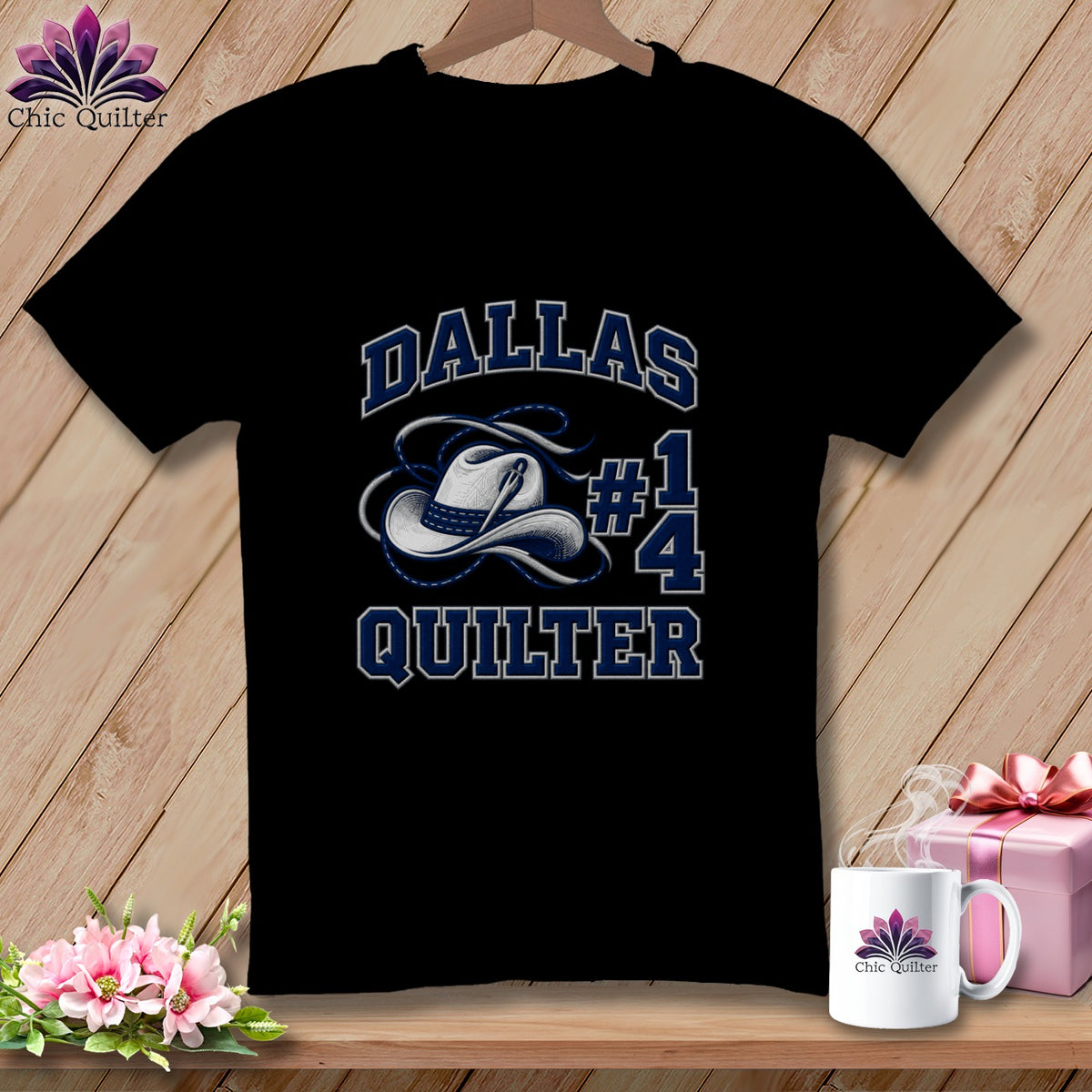 A black t-shirt displays white and blue text reading Dallas Quilter with a cowboy hat and needle graphic.