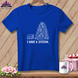 Blue t-shirt with stacked fabric and chaotic fabric pile graphic and text 