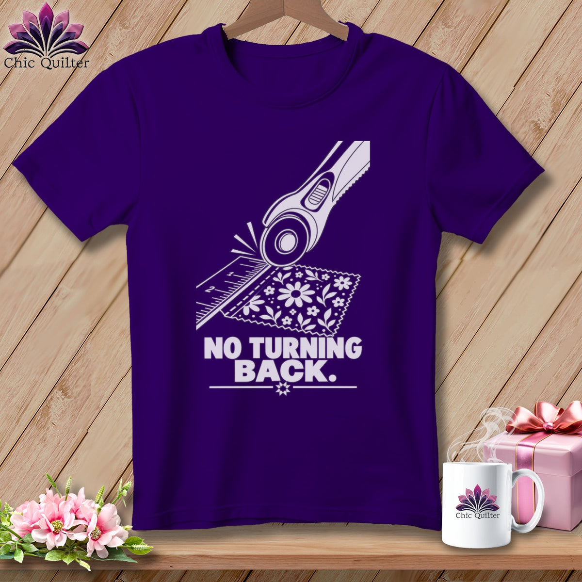 Purple t-shirt with rotary cutter graphic and "No Turning Back" text.