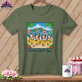 Olive green t-shirt featuring a graphic of four hula-dancing penguins on a beach, with the text Aloha Quilt Bee.