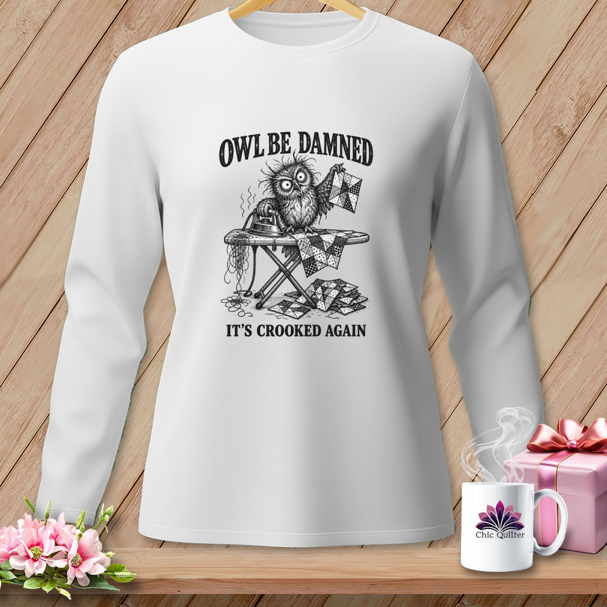 White long-sleeve shirt with owl ironing quilting blocks, text "Owl Be Damned, It's Crooked Again".