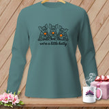 Teal long-sleeve shirt with three cartoon bats drinking from glasses, saying 