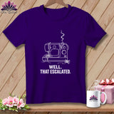 Purple t-shirt with white line art of a sewing machine and the text 