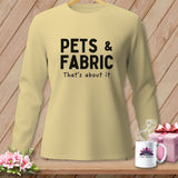 Light yellow long-sleeve shirt with black text 