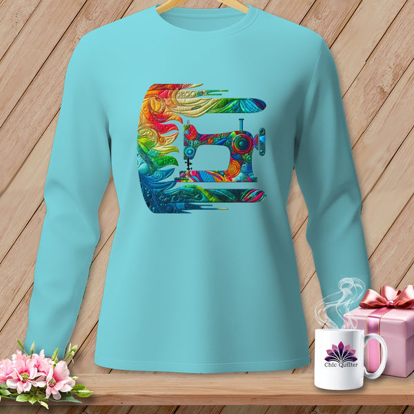 Light blue long-sleeve shirt with colorful, abstract sewing machine graphic.
