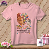 Pink t-shirt with chickens and colorful quilted tail feathers, text 