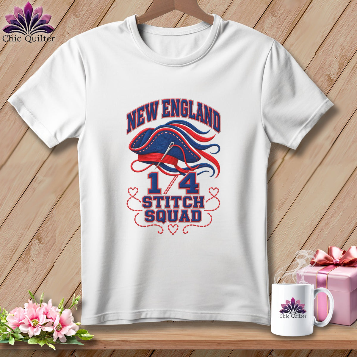 White t-shirt with a blue and red graphic featuring the text New England 1/4 Stitch Squad.