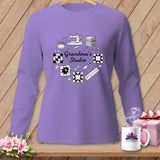 Purple long-sleeve shirt with sewing and quilting graphics, text 