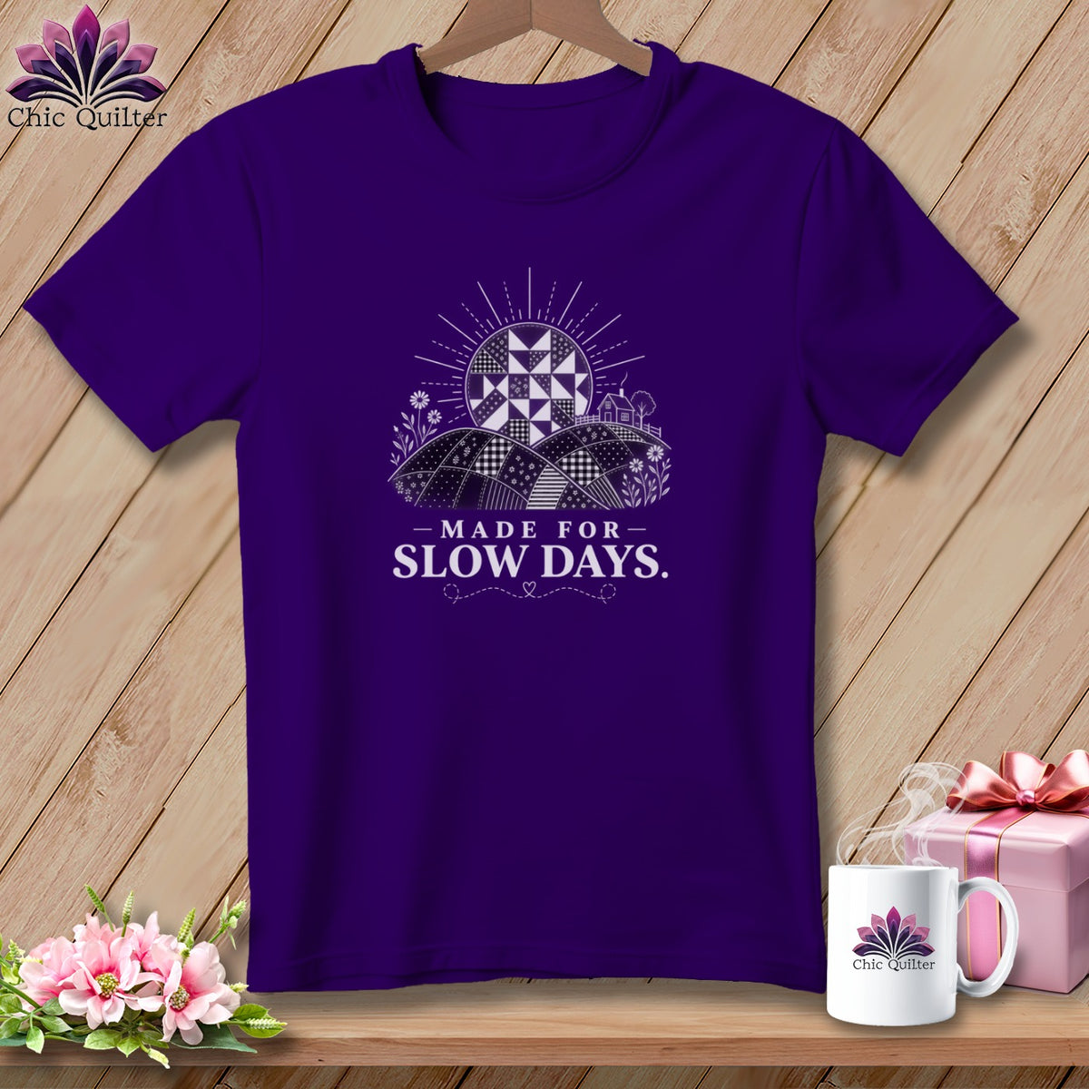 Purple t-shirt with quilted sun graphic and text "MADE FOR SLOW DAYS."