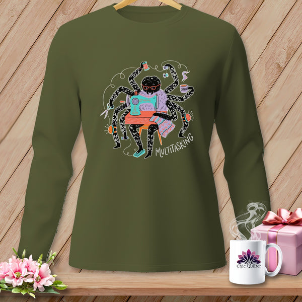 Green long-sleeve shirt with a spider sewing and the word MULTITASKING.