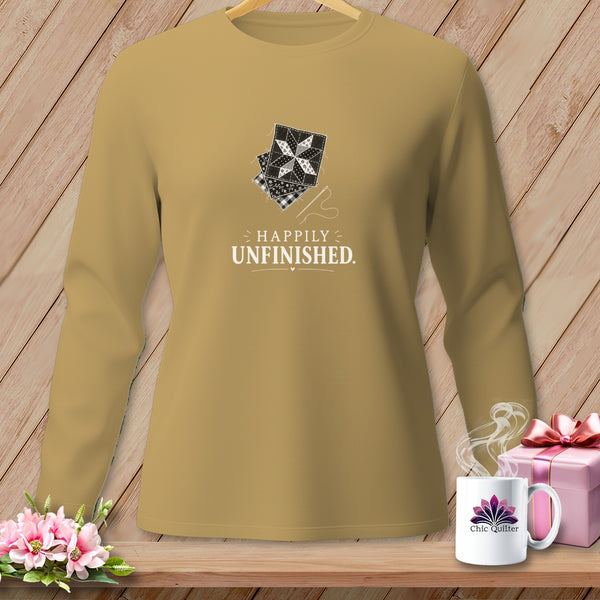 Brown long-sleeve shirt with "Happily Unfinished" text and quilt block design.