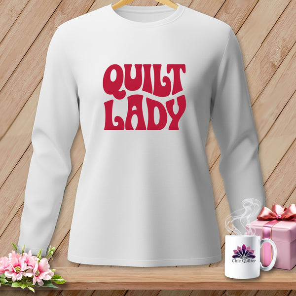 White long-sleeved shirt with "QUILT LADY" graphic and a mug.